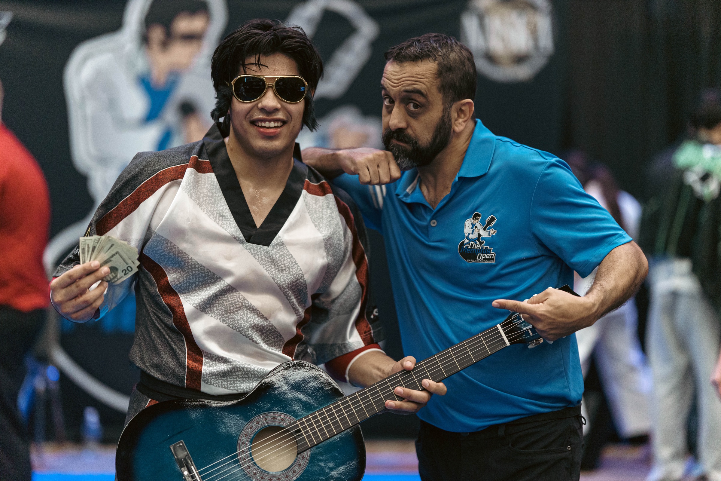 Memphis Open Grand Champion Alex celebrating with the Blue Guitar and Joey Perry